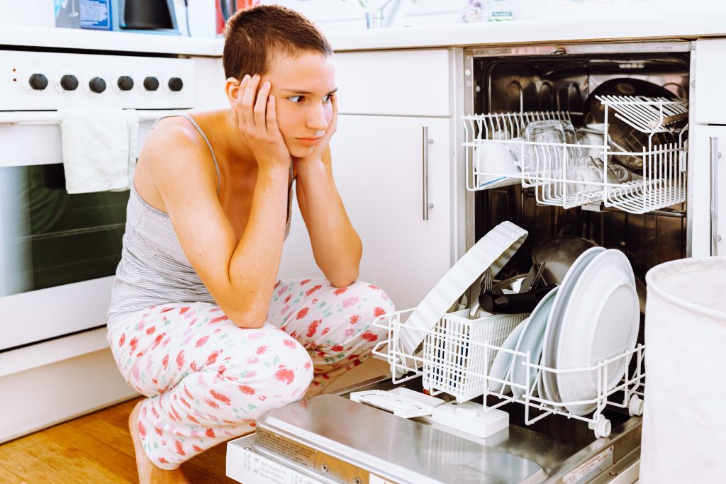 What causes a bad smell in the dishwasher